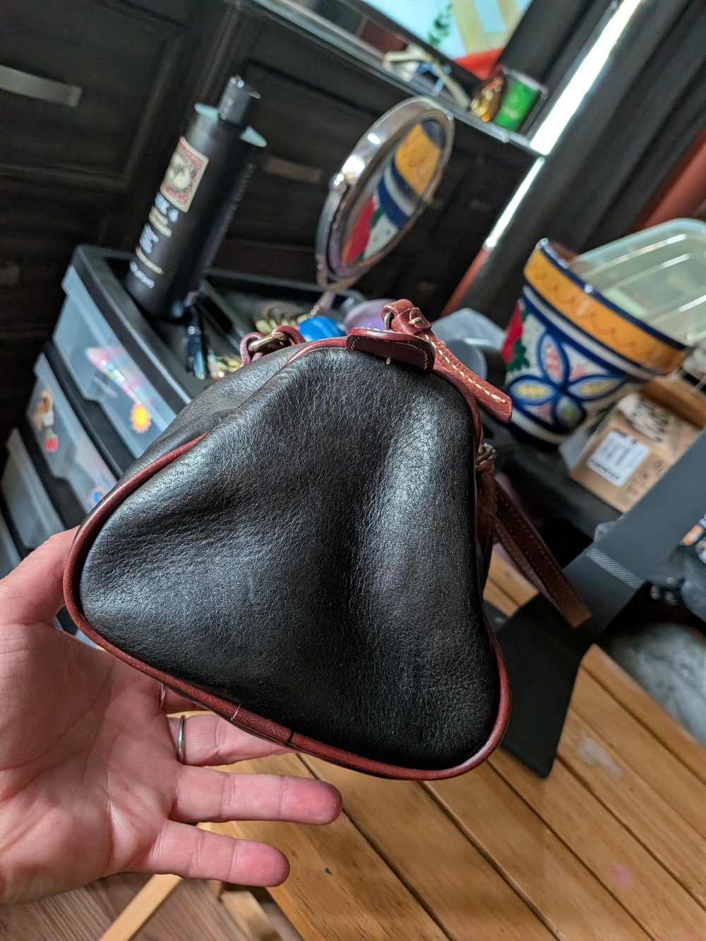 Dooney & Bourke Black Leather Barrel Bag with Brown Trim and Gold Hardware - Picture 5 of 7